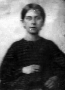 Black and white image, slightly blurry from age